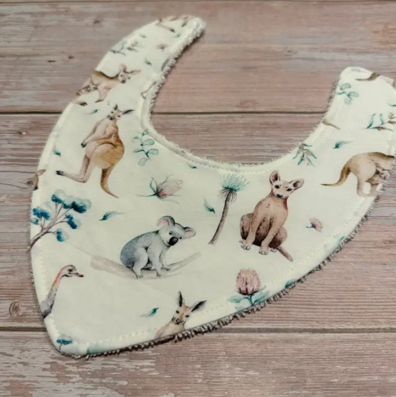 "Finished with a Kiss” - Handmade Baby Bibs
