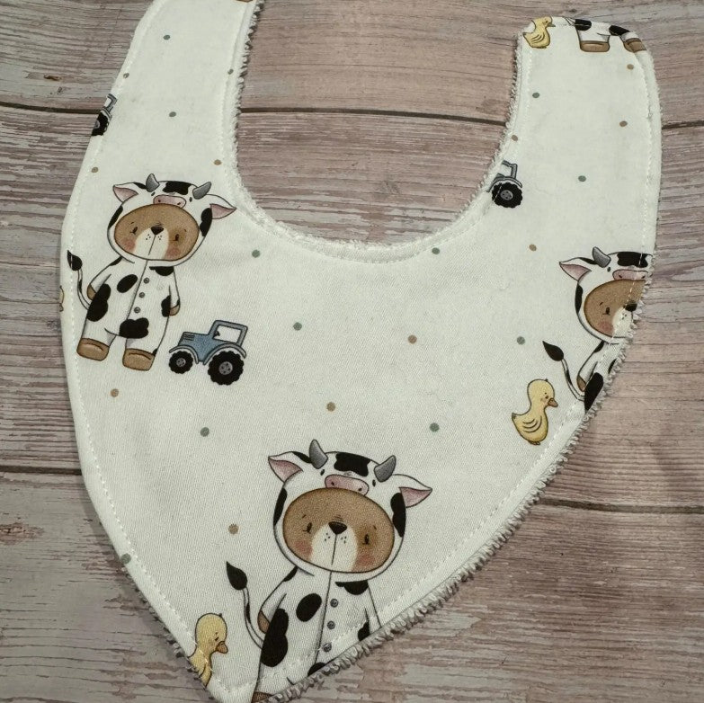"Finished with a Kiss” - Handmade Baby Bibs