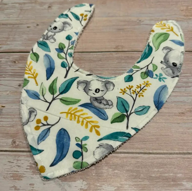 "Finished with a Kiss” - Handmade Baby Bibs