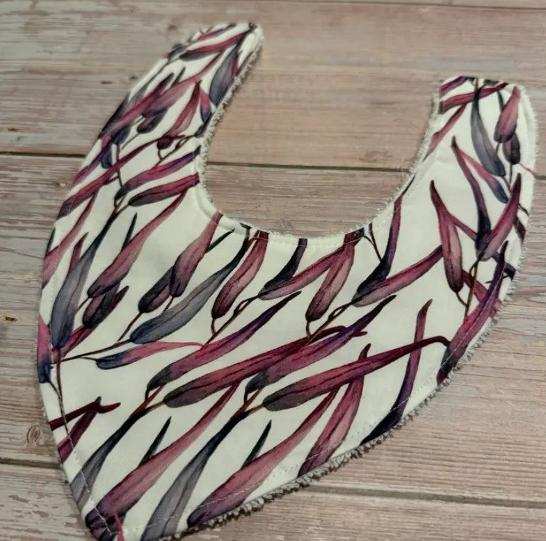 "Finished with a Kiss” - Handmade Baby Bibs