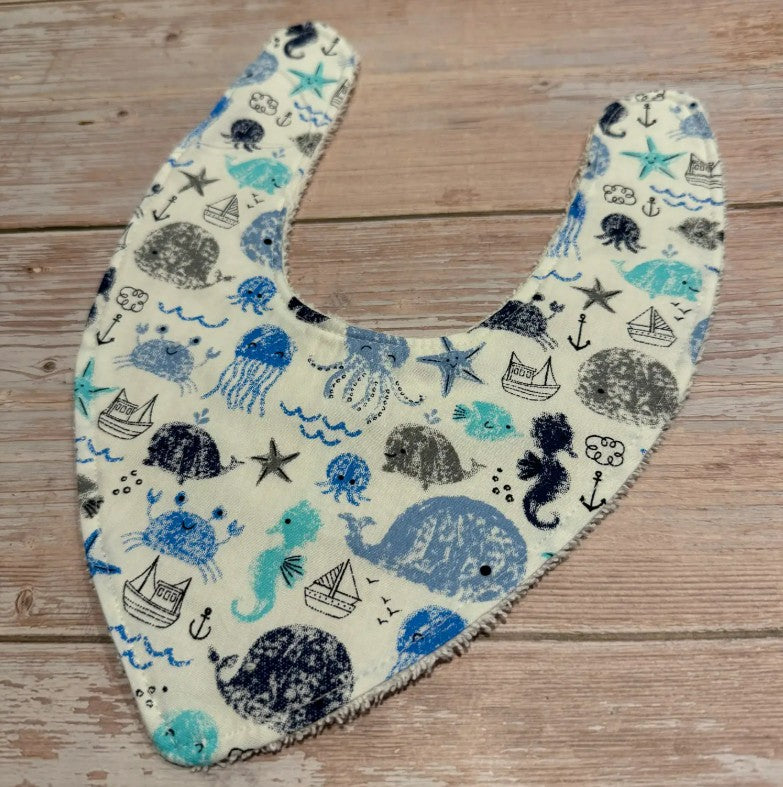 "Finished with a Kiss” - Handmade Baby Bibs