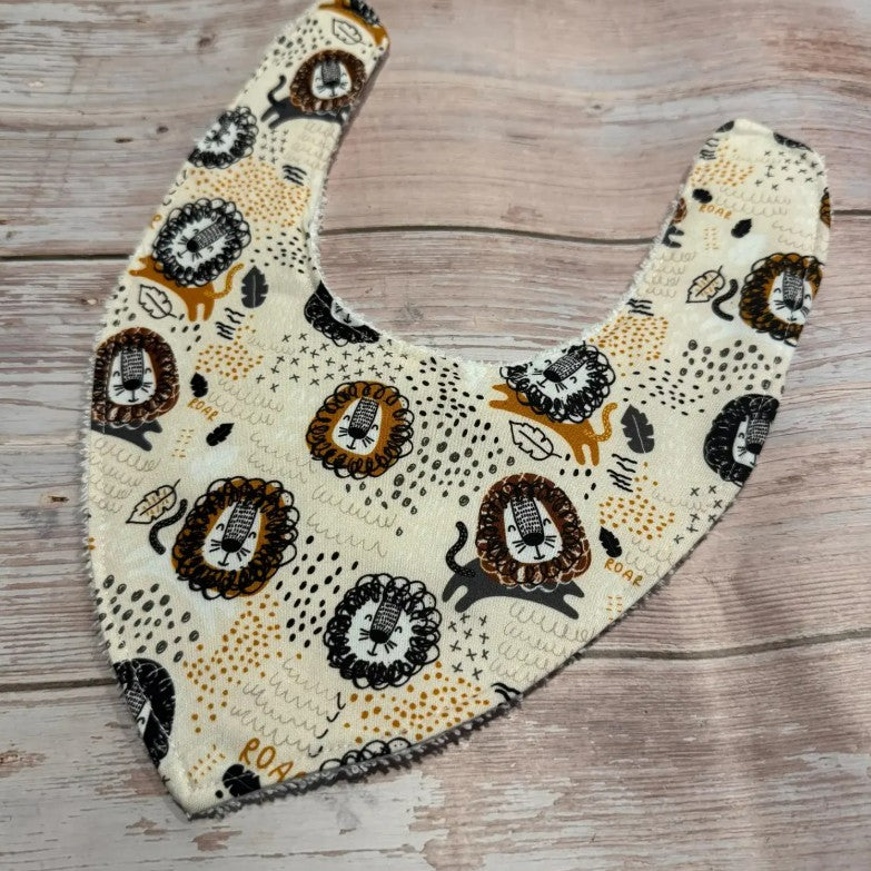 "Finished with a Kiss” - Handmade Baby Bibs