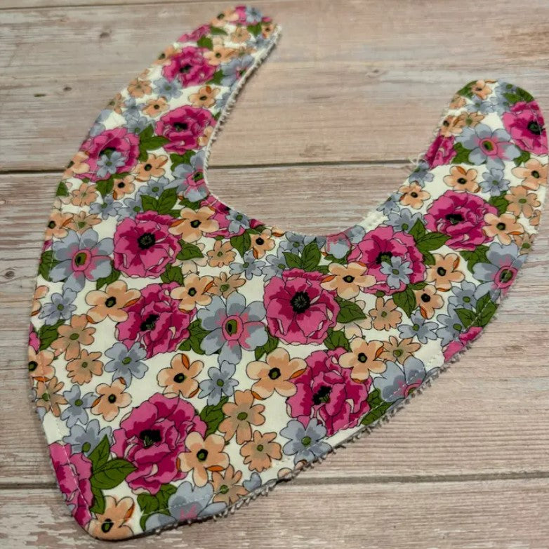 "Finished with a Kiss” - Handmade Baby Bibs