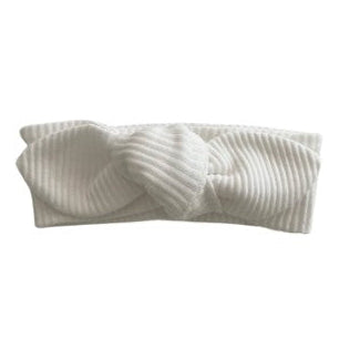 White ribbed knotted headband on a white background