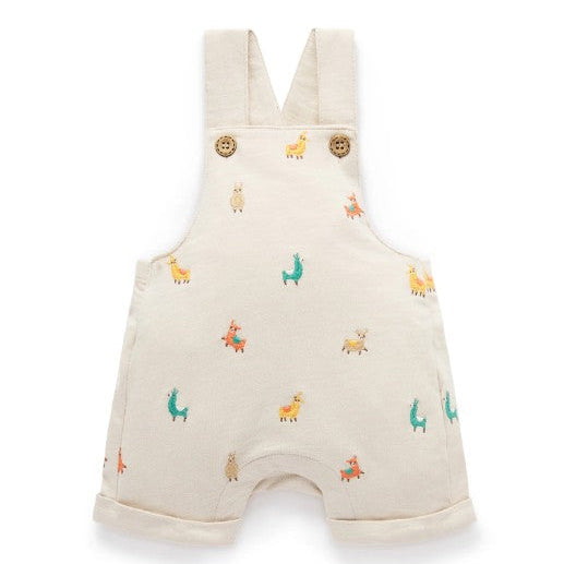 Beige baby romper with animal pattern on a white background